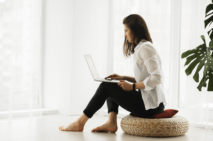 Lady working, using Gensolve Telehealth